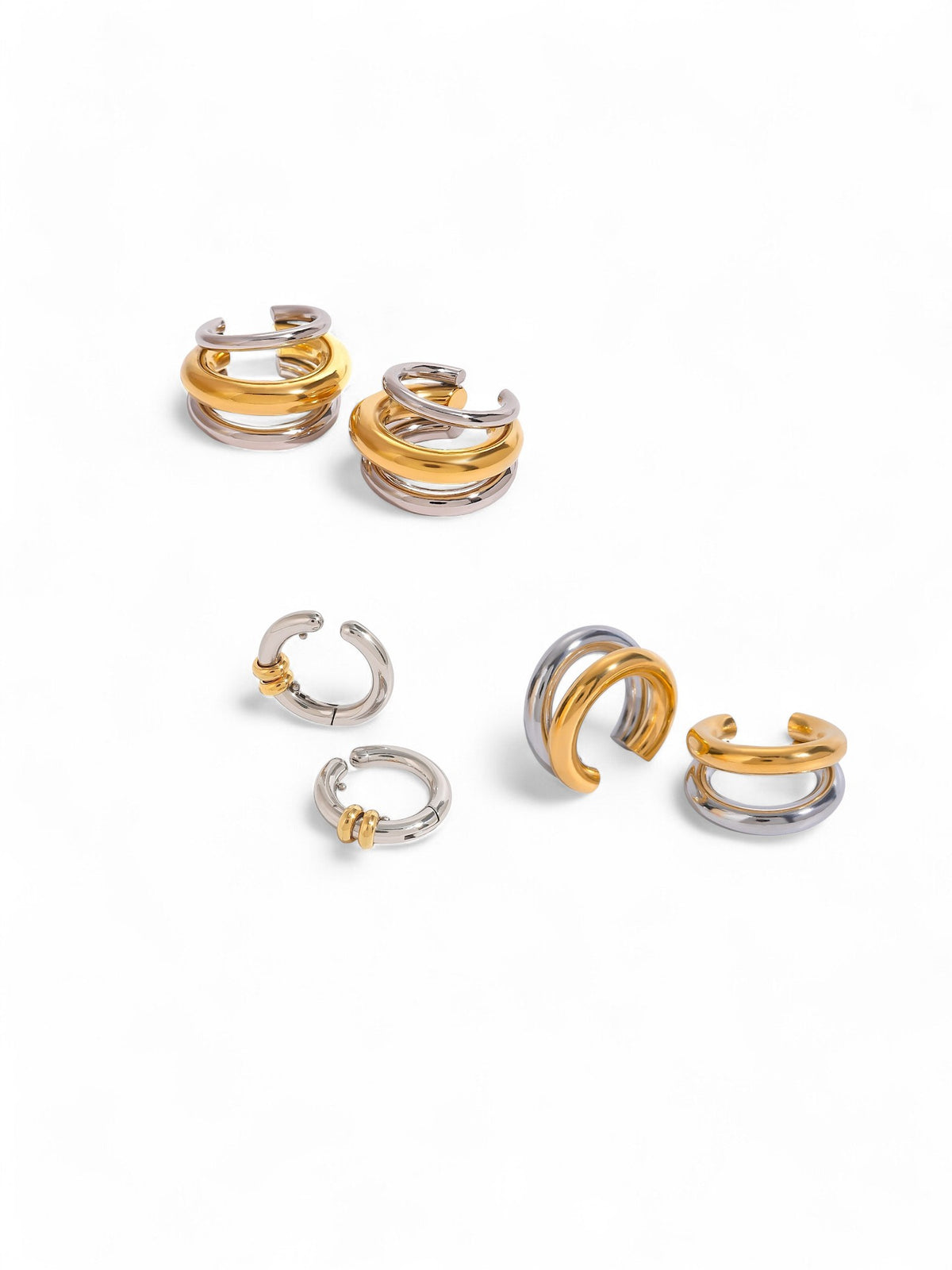 Twin metal cuff earrings