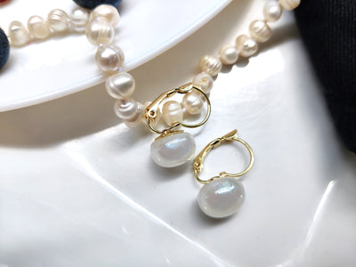 Elegance Redefined: The Timeless Allure of Pearl Hoop Earrings