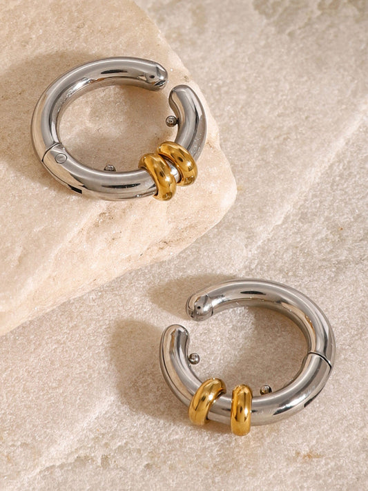 Twin metal cuff earrings