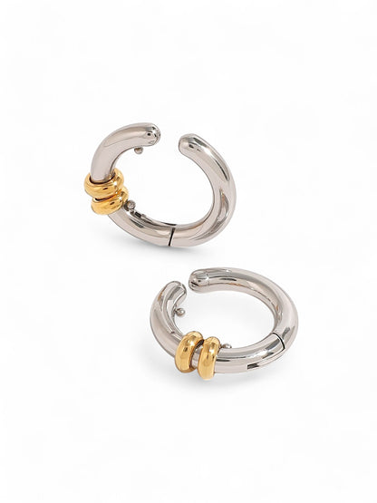 Twin metal cuff earrings